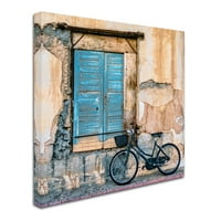 Трговска марка ликовна уметност „Стариот прозорец и велосипед“ платно уметност од Georgeорџ Дигалакис